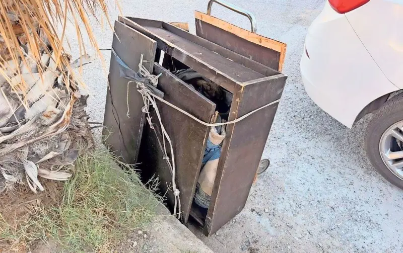 Localizan cuerpo dentro de un cajón de madera