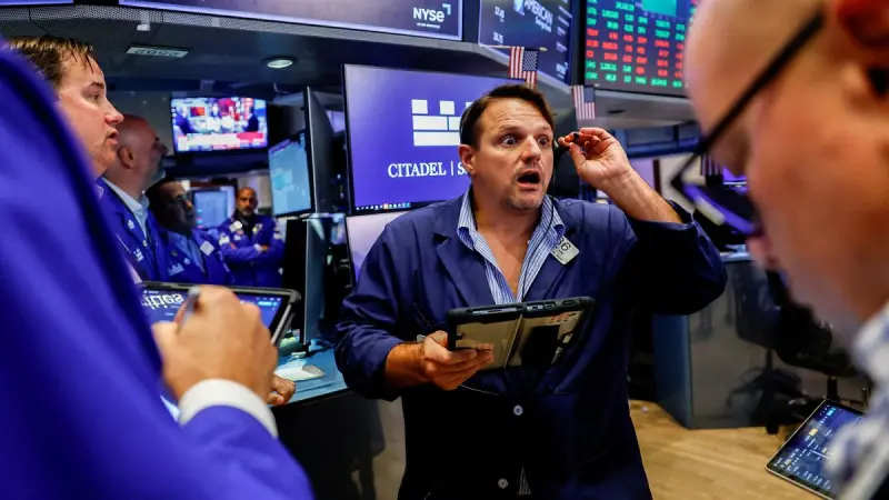 Wall Street cierra con retrocesos tras decisión de la Fed de subir sus tasas de interés