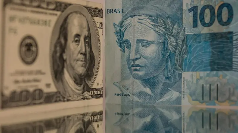 Real brasileño sube 4.5% frente al dólar tras primera vuelta entre Flávio Bolsonaro y Lula da Silva