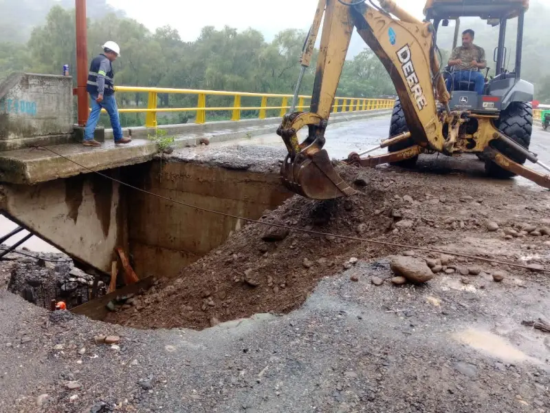 Provocan lluvias colapso de 10 pasos provisionales en 7 municipios